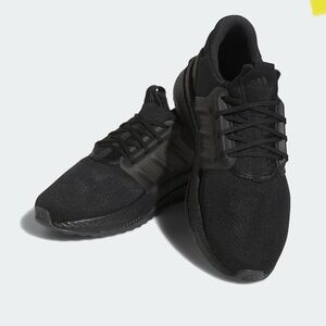 adidas Black Sneakers with Breathable Knit Upper and Sleek Modern Design